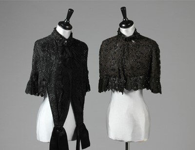 Lot 4 - A group of black beaded fichus, a beaded...