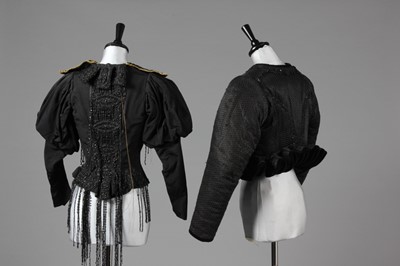 Lot 4 - A group of black beaded fichus, a beaded...