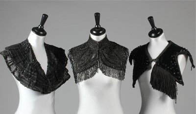Lot 4 - A group of black beaded fichus, a beaded...