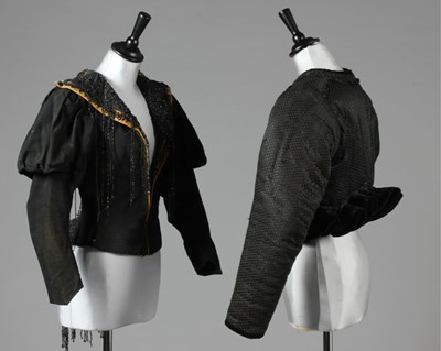 Lot 4 - A group of black beaded fichus, a beaded...