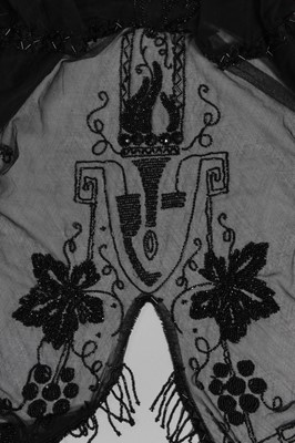 Lot 9 - A beaded black tulle tabard circa 1918, with...