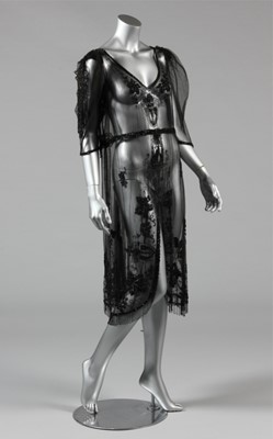 Lot 9 - A beaded black tulle tabard circa 1918, with...