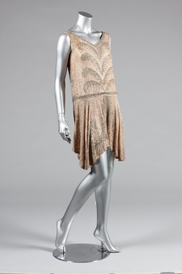 Lot 13 - A pale pink beaded muslin flapper dress, circa...