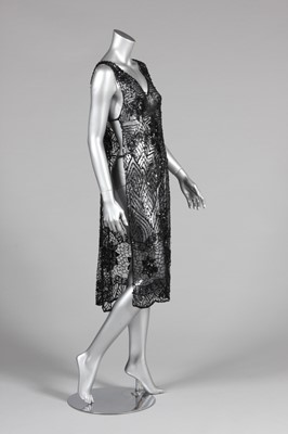 Lot 14 - A black sequined tabard circa 1918-20, the...