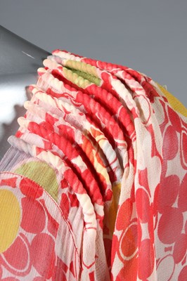 Lot 21 - Two floral printed chiffon dresses, early...