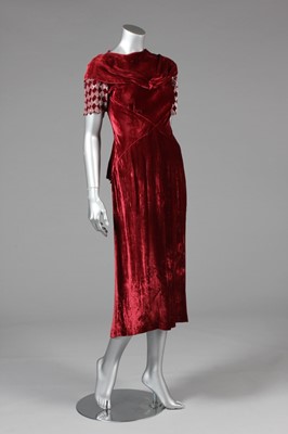 Lot 22 - Three bias-cut velvet evening gowns, 1930s,...