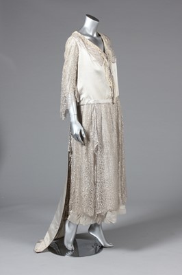 Lot 23 - A striped satin and silver lace evening gown,...
