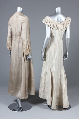 Lot 23 - A striped satin and silver lace evening gown,...