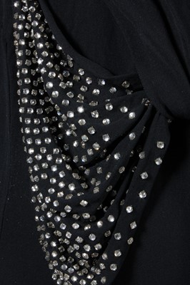 Lot 25 - A black georgette evening gown with rhinestone...