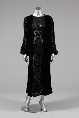 Lot 32 - A black sequined velvet evening cape, 1930s,...