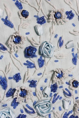 Lot 41 - A pale blue chiffon couture cocktail dress,...