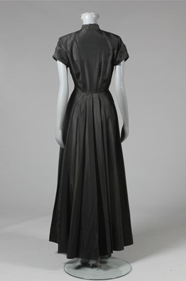 Lot 46 - Three black evening gowns, 1950s-c.1960,...