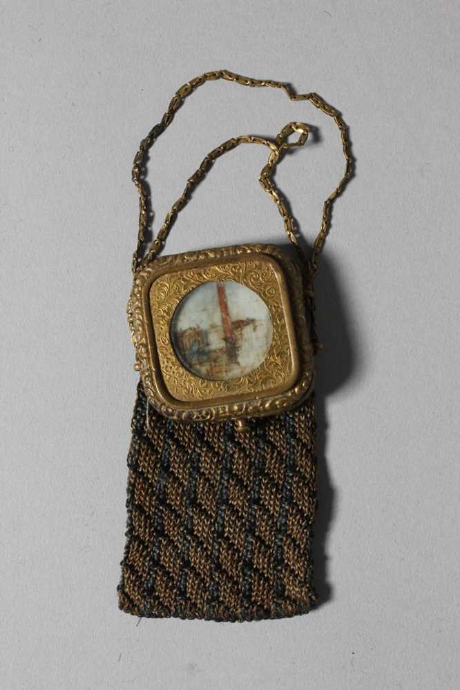 Lot 58 - A knitted silk reticule, the gilt metal...