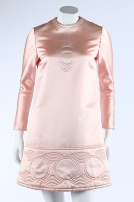 Lot 139 - A Pierre Cardin quilted rose-satin mini-dress,...
