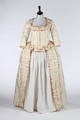Lot 24 - A rare brocaded silk robe à la Piémontaise,...