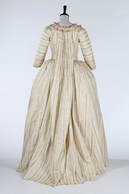 Lot 24 - A rare brocaded silk robe à la Piémontaise,...