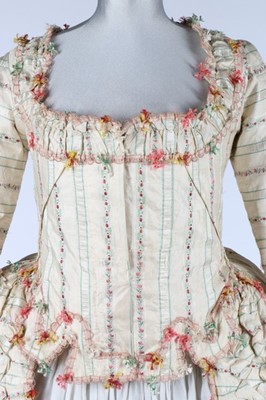 Lot 24 - A rare brocaded silk robe à la Piémontaise,...