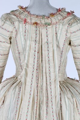 Lot 24 - A rare brocaded silk robe à la Piémontaise,...