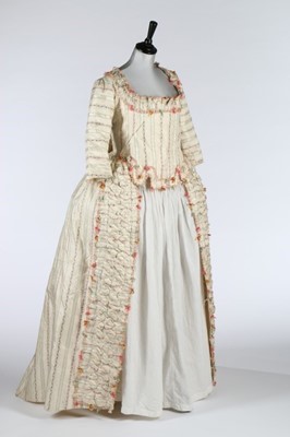 Lot 24 - A rare brocaded silk robe à la Piémontaise,...