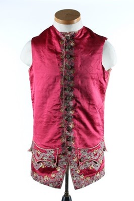 Lot 23 - A brocaded crimson satin waistcoat, French,...