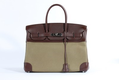 Lot 9 - An Hermès canvas and calf leather Birkin,...