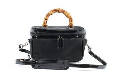 Lot 7 - An un-used Gucci vanity case, 1990s, with...
