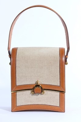 Lot 8 - A fine Hermès tan leather and canvas 'Eperon'...
