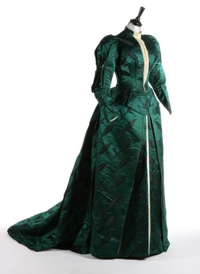 Lot 33 - A Charles Frederick Worth bottle-green...