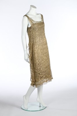 Lot 42 - A rare Gabrielle Chanel gold lace cocktail...