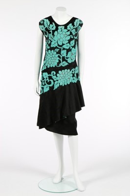 Lot 54 - An orientalist beaded satin cocktail dress,...