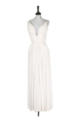 Lot 197 - A Madame Grès couture pleated ivory silk...