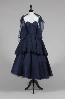 Lot 109 - A blue lace ball gown, mid 1950s, labelled...